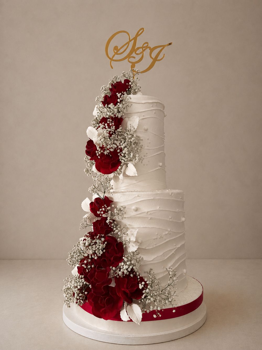 Wedding cake with red roses