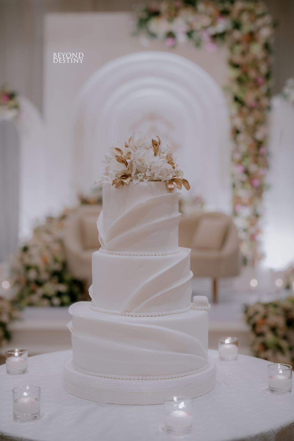 Wedding cake with gold leaf detail